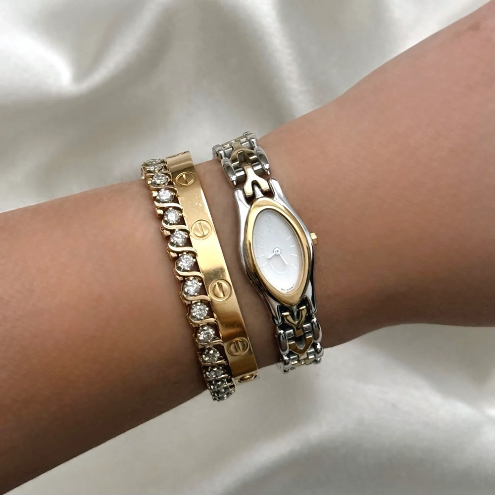 Yves Saint Laurent Two-Tone Gold and Silver Oval Bracelet Watch